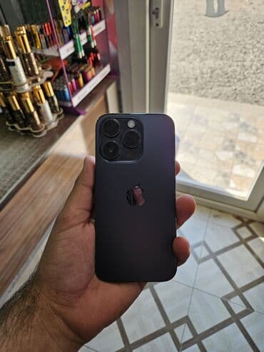 beko 8: IPhone 14 Pro, 128 GB, Mərcanı, Face ID, Barmaq izi, Simsiz şarj — 2