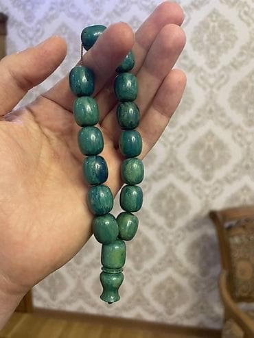 Dolu tərkibdə olan katalin təsbeh.Fenol ve formaldehit maddelerinden