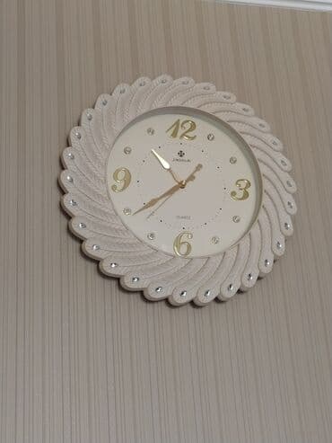 Divar saatları, Mexaniki, Saniyə əqrəbi