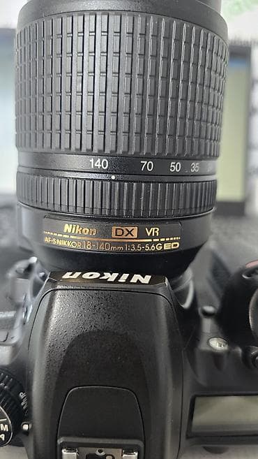iphone 11 o: Nikon D7500 + AF-S DX NIKKOR 18-140mm f/3.5-5.6G ED VR fotokamera — 2