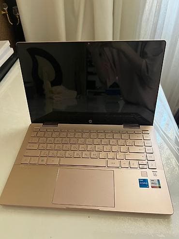 HP Pavilion x360 2-in-1 noutbuk satılır. Sensor ekranlıdır və 360°