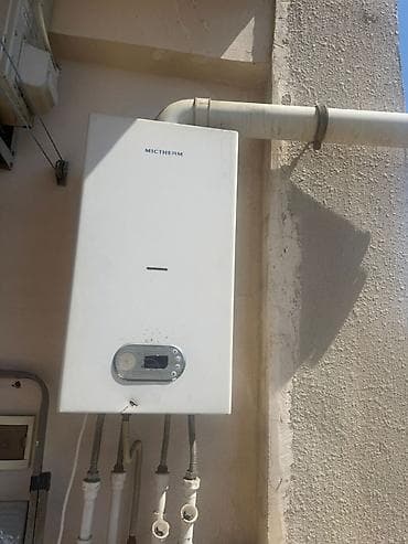 Mictherm qaz kombi sistemi tam işlek 2 esenjor satilir 200 azn -