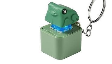 Dino LED açarlıq oyuncağı - Dizayn: Kiçik kvadrat korpusdan çıxan