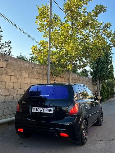 disk qabi: Kia Rio hatchback, qara rəng, maşın ideal veziyyetdedi maşını — 6