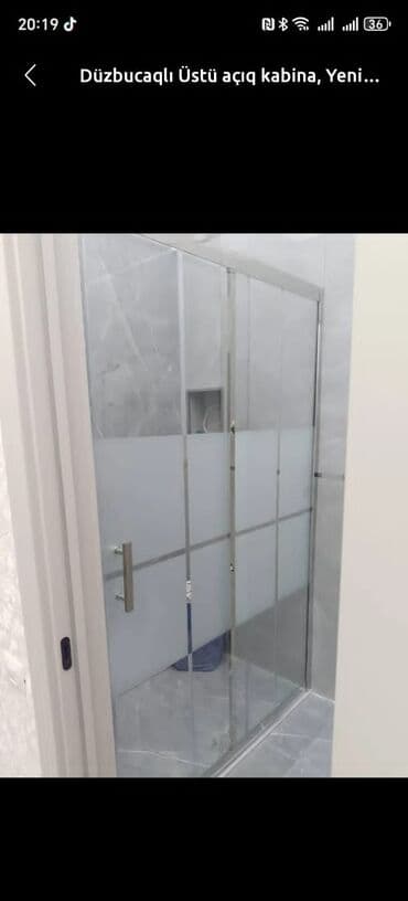 Truba: Gümüşü rəngli metal çərçivəyə malik, qismən buzlu şüşəli duş kabinəsi — 2