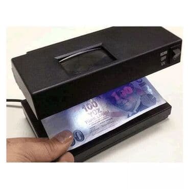 Pul yoxlayan aparat Xususi ultra-bənövşeyi işiği ilə istənilən pulun