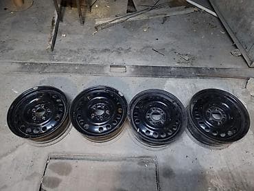 traktor şinləri: Məhsul: 4 ədəd polad disk komplekti Xüsusiyyətlər: - Ölçü: 15" - Bolt — 4