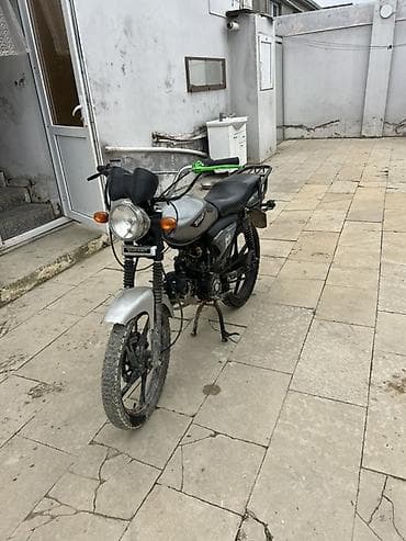 arxa suse: Sino M50 motosiklet - Mühərrik: 50 sm³, karbüratorlu, hava soyutmalı — 3