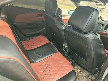 sukan satisi: Chevrolet Aveo sedan – ağ rəng, kompakt və iqtisadi şəhər avtomobili — 10