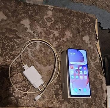 Redmi 12 smartfon Xüsusiyyətlər: - Ekran: Tam ekran, mərkəzi