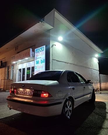 samand: İran Khodro Samand sedan Xüsusiyyətlər: - Kuzov: 4 qapılı sedan, ağ — 1