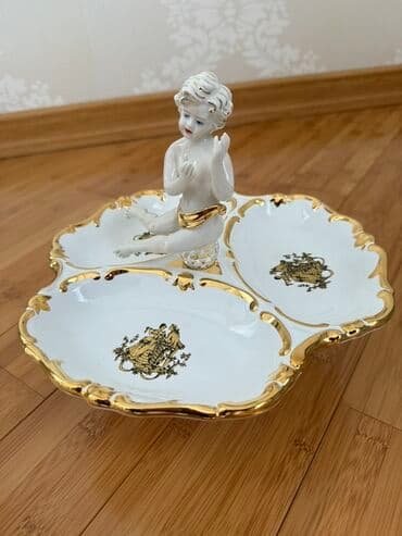 iran qablari: Məhsul üç bölməsi olan, farfordan hazırlanmış dekorativ qabdır. Ağ — 2