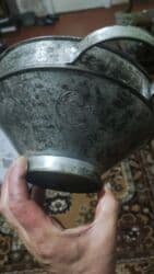 Qədim süd süzgəci