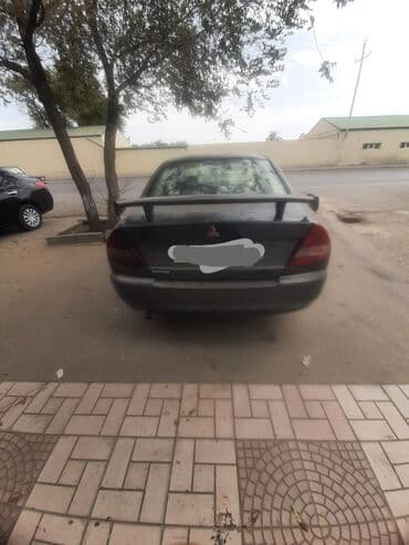 bmw s1000rr 2023 qiymeti: Mitsubishi sedan her gun surulen masindir - Korpus: 4 qapılı sedan — 2