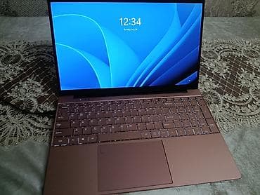 Digər noutbuklar və netbuklar: KurieTim noutbuku – zərif “rose gold” (çəhrayı-qızılı) metal gövdə — 3
