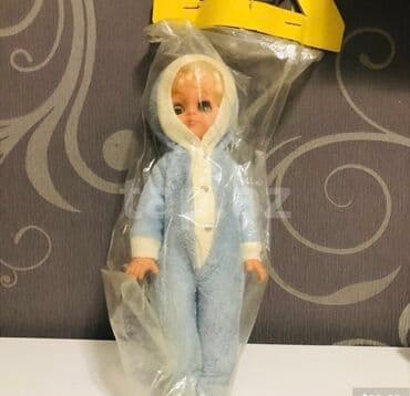 ГДР Qedimi kukla.Almaniya istehsali.teze.Şirin üz ifadəsi və sarı