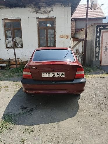 07 diskleri: Opel Vectra: 1.6 l | 1997 il 485 km Sedan — 3