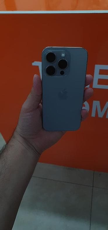 en ucuz apple macbook: IPhone 15 Pro, 128 GB, Natural Titanium, Face ID — 3