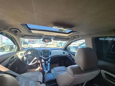 nissan sunny 2005: Chevrolet Cruze: 1.4 l | 2011 il 370000 km — 5