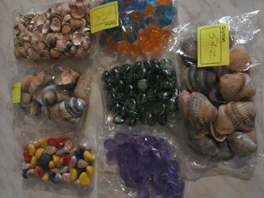 bit darağı qiyməti: Baliqqulaqlari ve rəngli daşlar 1 packasi 5 azn və 8 azn — 1
