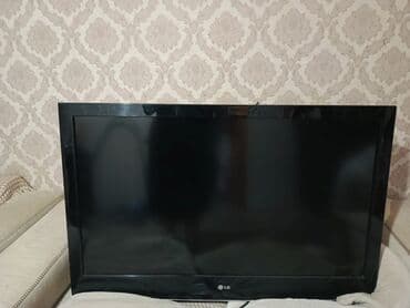 продать старый телевизор: LG markalı qara rəngli televizor. Cihazın ekranı geniş görüntü — 1