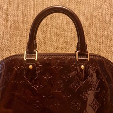 qaşlı çanta: Əl çantası, Louis Vuitton — 10