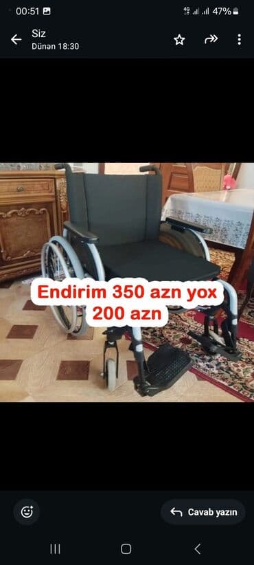 əlillər üçün araba: Təkərli əlil arabası, istifadəçiyə rahat və etibarlı hərəkət imkanı — 1