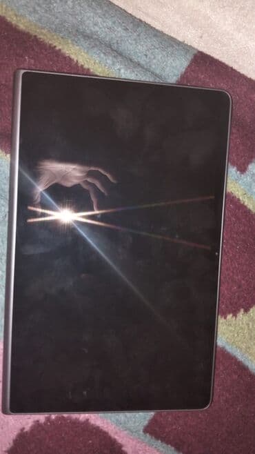 ucuz tabletlər: Lenovo planşet Xüsusiyyətlər: - Lenovo dizaynı, metal gövdə - Arxa — 2