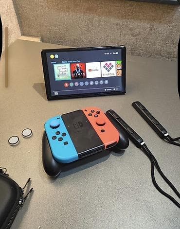 Elektronika: Nintendo Switch konsolu – neon mavi/qırmızı Joy‑Con nəzarətçiləri ilə — 5