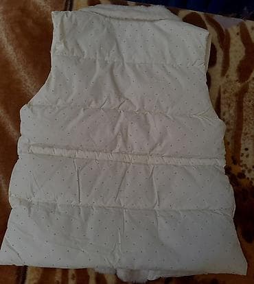 Aksesuarlar: Qadınlar üçün zərif ağ şişmə jilet - Rəng: qar ağ - Material: yumşaq — 2