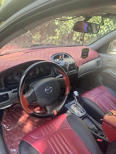 klas 6: Nissan Sunny: 1.6 l | 2008 il Sedan — 4