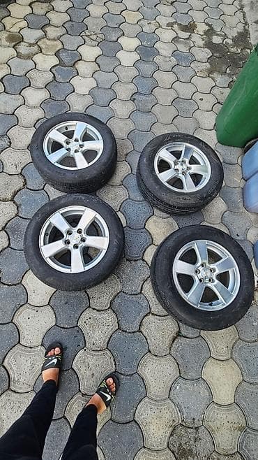 teker 215 55 16: Chevrolet orijinal 5 qolçaqlı yüngül lehimli disk + şin komplekti - — 3
