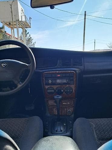 w210 yan guzguler: Opel Vectra: 2 l | 1996 il 27000 km Sedan — 7