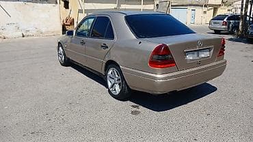 audi a6 c5: Mercedes-Benz C-Class: 2.2 l | 1994 il Sedan — 5