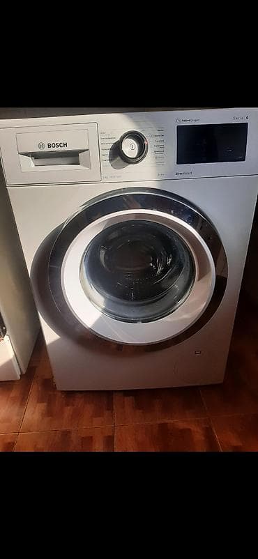 balans val: Bosch Serie 6 paltaryuyan maşın - Ön yükləməli, paslanmayan polad — 1