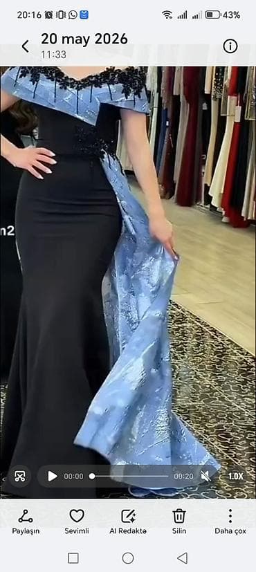 Qara rəngdə, bədənə oturan ziyafət/libas. Model balıq kəsimlidir, yerə