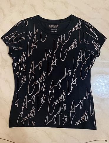 banner capı: Guess qadın T‑şortu - Brend: GUESS - Model: Los Angeles temalı qrafik — 1