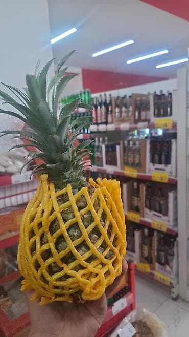Yarımfabrikatlar: Ananas – tam baş, yaşıl taclı, qoruyucu köpük torla qablaşdırılmış — 1