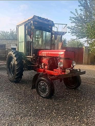 Satılır: kabinəli təkərli traktor Xüsusiyyətlər: - Ön iki təkərli