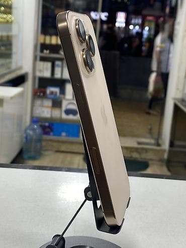 philips xenium 9@9d: IPhone 15 Pro, Natural Titanium, Face ID — 4
