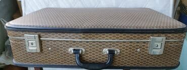 Нарды: Naxışlı səthə malik, qəhvəyi rəngli vintaq çamadan. Çamadanın qara — 3