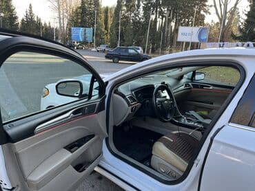 mercedes benz e 2000: Ford Fusion sedan – ağ rəng, 4 qapı, tam ölçülü şəhər/tras sedanı — 7