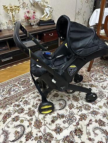 chicco trio sprint universal arabalar: Doona uşaq avtomaladı/kolyaska 2‑si 1‑də - Avtokreslo və kolyaska — 1