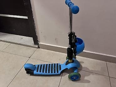 Мопеды, скутеры: Uşaq skuterı – 3 təkərli, mavi rəng Xüsusiyyətlər: - Ön hissədə 2 — 4
