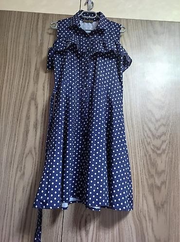 prakat donlar: Xanım paltarı – tünd göy rəngdə, ağ xallı dizayn. - Model: qolsuz — 1