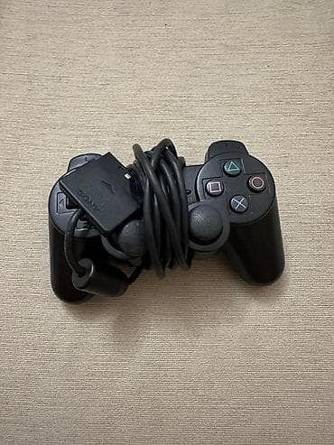 ps1 disk: PlayStation 2 Slim oyun konsolu. Kompakt və nazik korpusa malik PS2 — 9