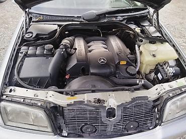 on lip: Mercedes-Benz 240: 2.4 l | 1998 il — 8