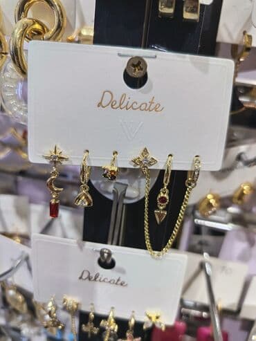 sebeke qizil sirqalar: Zərgərlik dəstləri – zövqlü aksesuar seçimi 1) Yaşıl daşlı çiçək — 5