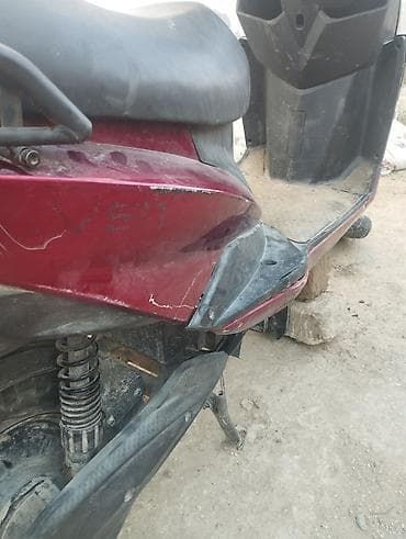mopet elektrik: Moped qeza olunub qabag plasmaslari ezilib yanlari cizilib ama tok — 4