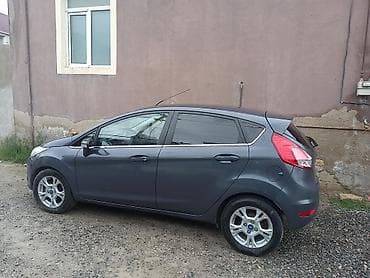 opel astra 2012: Ford Fiesta hatchback — tünd boz rəng, 5 qapı. Xüsusiyyətlər: - — 3